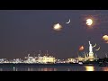 Three Moons and a Statue - A Moon-Stack Time-lapse of the crescent moon, half full and full moon