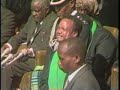 Chiluba praying during funeral of the Zambia National team in 1993