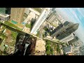 Drone climb up a skyscraper with stunning reflections