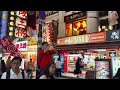 Walking tour shopping street Dotonbori in Osaka japan