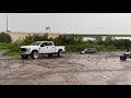 Ford F-250 6.2 on 22x14 bogger pulling out a stuck Toyota