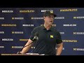 Michigan football coach Jim Harbaugh talks about his chickens