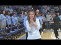 Lou Patalano's family and friends wear jerseys reflecting each UNC women's lineup on the court