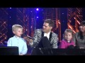 Michael Buble let it go/ you got a friend in me brings kids on stage