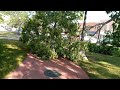 Town square at 8:30am a large limb broken from an old tree, it blocked the sidewalk