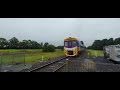 First Steel Coil train of 2024AD at Tyabb, Australia in the summer rain. + bonus bug.