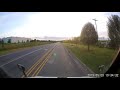 Stupid motorcyclist makes illegal pass and cuts off semi