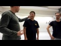 Sifu Lu Baochun of the Baji Association Finland teaching posture to a student