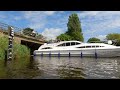 Boats passing under Ludham Bridge