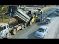 Amazing Road construction project by using heavy machinery to build a new road with a paver machine