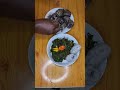 Let's eat boiled cocoyam and sautéed njama njam (huckleberry) #vegan #shortsvideo #cameroonfood.#yum