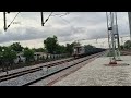 Indian railway#Double wagon train passing through station#goods train