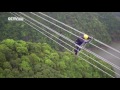 Men on wire: Power workers walk in the clouds to repair lines