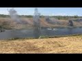 imitation of battle. Russian armored personnel carrier crossing the reservoir