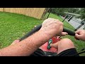 Mowing a backyard with a fenced in pool
