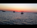 Crowds Cheering Ibiza Sunset Outside Cafe Mambo from boat