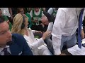 Kyrie Irving gets into it with Celtics fan after diving into crowd 