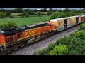 Amtrak #4 Southwest Chief in morning sunlight; New paint on westbound pumpkins leading a manifest