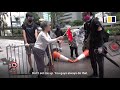 Elderly woman vents frustration at Hong Kong protesters