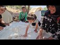 Training day: Akram teaches her children how to bake ''Tiri'' bread