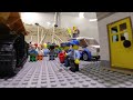 Dam Breach Experiment - Lego people try to hold off a dam breach with a large excavator