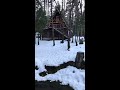 A frame cabin in the snow