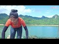 Island girl's massive fishing and shrimp harvesting: Using a winch to pull full traps on the lake