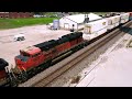 Mavic Air 2 aerial view of an eastbound double-stack as it passes a grain elevator in Carrollton MO