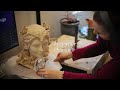 sculpting a clay bust