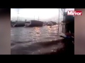 Thai thrill seeker makes the most of monsoon floods riding his Jetski