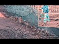 Dangerous iron crusher hopper ore cleaning job, Amazing Video of cone crusher hopper cleaning