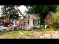 House demolition VIA excavator