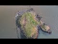 a fly around lindisfarne village and st cuthberts beach dec 2022 at sunset