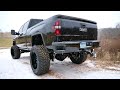 LIFTED GMC DENALI HD IN THE SNOW