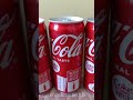 My Coca-Cola Collection of glass bottles,  cans, and cool merchandise