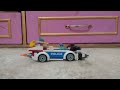 Bob picking a Sword| A car passing by| Lego stop motion film