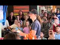 Comedian ADAM RAY throws a fish at Seattle’s Pike Place Public Market