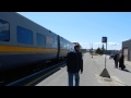 CN Freight train pass by Kingston Station/VIA Train 61 arriving at Kingston