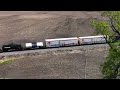 Surprise visit by Montana Rail Link #4313 then  meets an eastbound manifest on the Southern TRANSCON