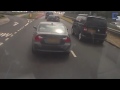 Dashcam footage shows furious Corsa driver punching BMW motorist