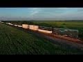 Intermodal cuts through the corn fields illuminated by the setting sun