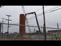 Demolition of smokestack at Osram Sylvania plant Central Falls RI