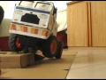 Homemade rc truck crawling on boxes