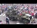 Parade des fanfares américaine et de véhicules militaires d époque a Sainte Mère Eglise.