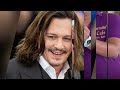 Johnny Depp flashes new pearly whites after his ‘rotting’ teeth went viral