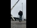 Light pole installation boom truck