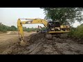 KOMATSU200+CAT320ช่วยกันดึงสะโลบแต่งขอบบ่อ