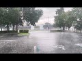 Rainy day at the laundromat, waiting out the rain, traffic going by on the street