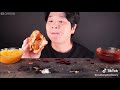 Guy demolishes some chicken burgers and some crispy chicken