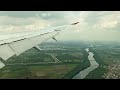 Bird Flying Dangerously Close to Airplane During Landing